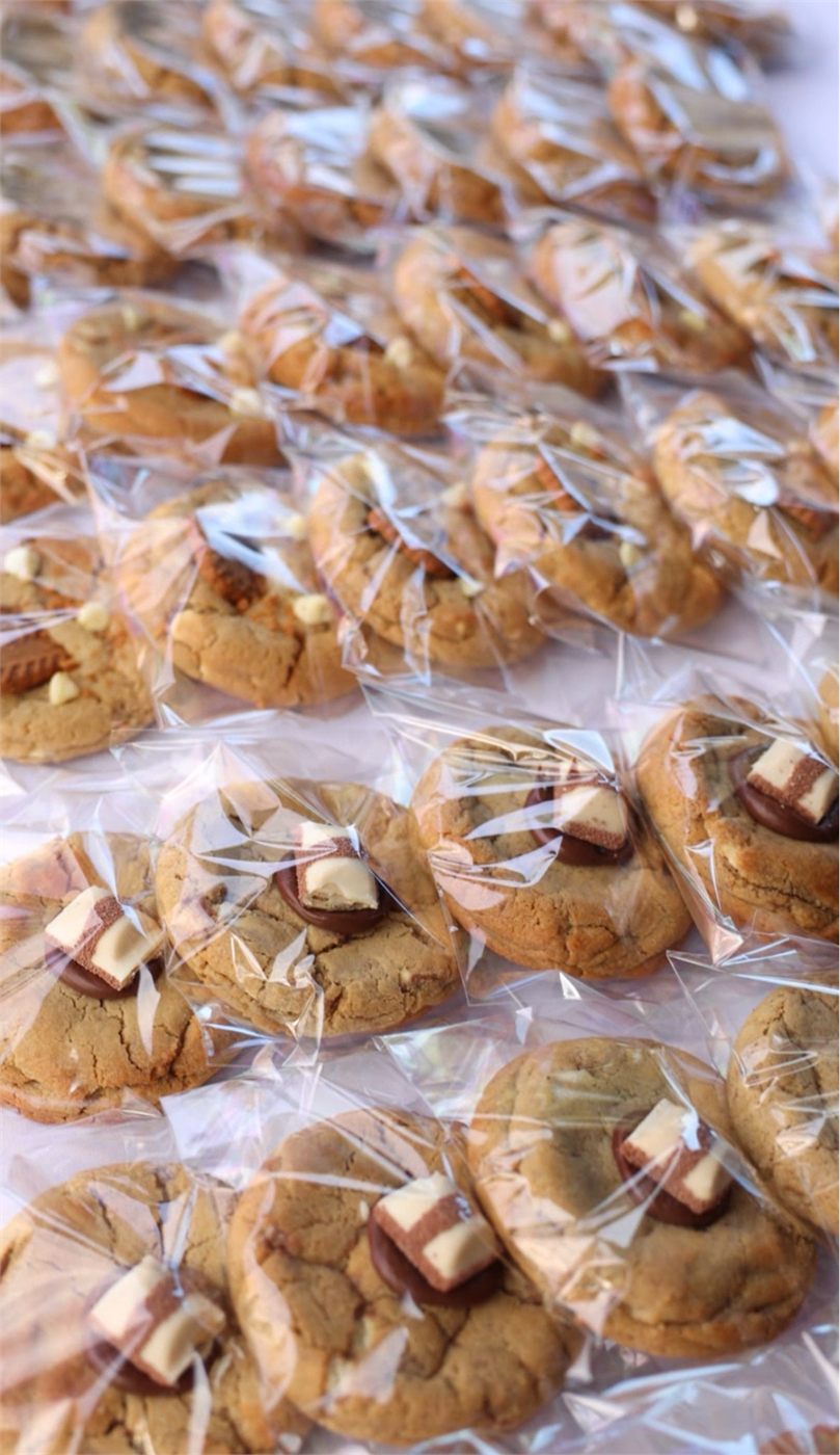 Dozens of individually sealed cookies ready to be boxed